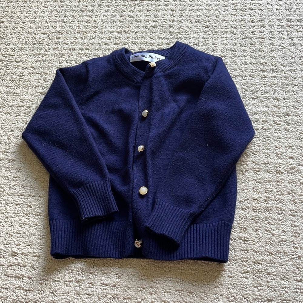 Blue smiling pinker cardigan
